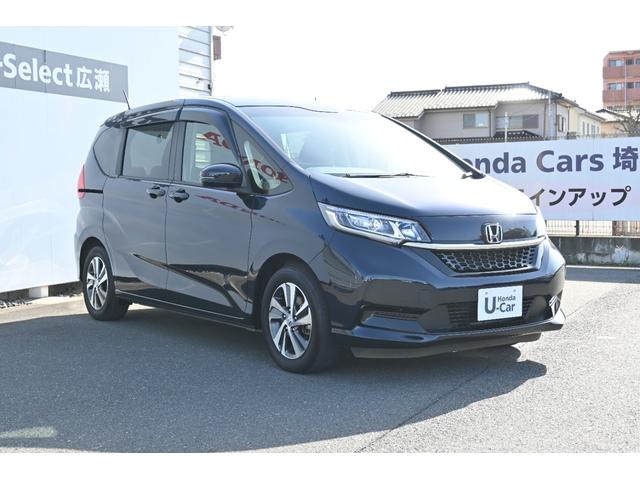 フリード Ｇ・ホンダセンシング　純正ナビ　フルセグ　Ｒカメラ　ＥＴＣ　ＦＲドラレコ　シートヒーター　アルミホイール　ＬＥＤライト　両側Ｐスライドドア　Ｆセグ　追突被害軽減ブレーキ　ｉストップ　Ｗエアバッグ　パワーウィンドウ　ＶＳＡ（6枚目）