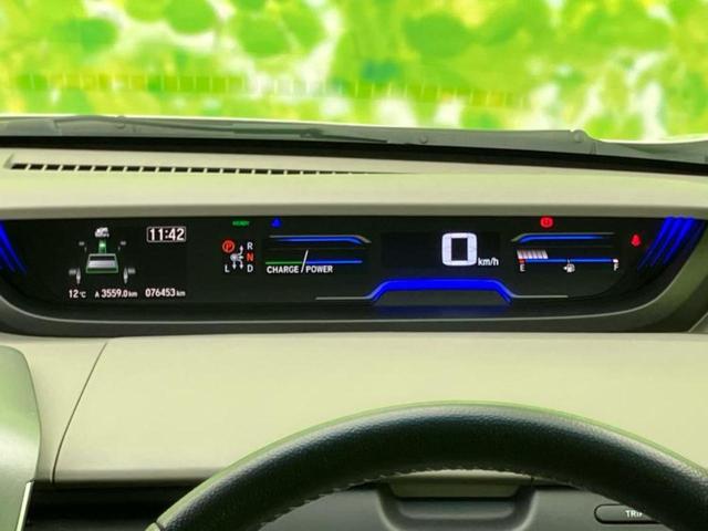 フリード+ハイブリッド ハイブリッドEX 新品タイヤ/純正エアロ/保証書/純正 SDナビ/衝突安全装置/両側電動スライドドア/シートヒーター/車線逸脱防止支援システム/シート ハーフレザー/ヘッドランプ LED/ETC/EBD付ABS 記録簿(15枚目)