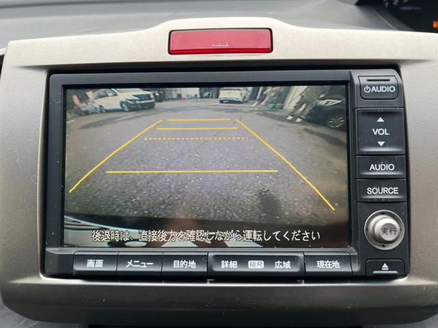 フリードスパイクハイブリッド ジャストセレクション　ハイブリッド　ＥＴＣ　バックカメラ　ナビ　ＴＶ　両側電動スライドドア　オートクルーズコントロール　ＨＩＤ　キーレスエントリー　アイドリングストップ　電動格納ミラー　ＣＶＴ　アルミホイール　ＣＤ　ＡＢＳ（4枚目）