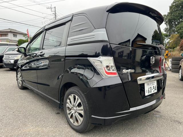 フリードスパイクハイブリッド ジャストセレクション　ハイブリッド　ＥＴＣ　バックカメラ　ナビ　ＴＶ　両側電動スライドドア　オートクルーズコントロール　ＨＩＤ　キーレスエントリー　アイドリングストップ　電動格納ミラー　ＣＶＴ　アルミホイール　ＣＤ　ＡＢＳ（18枚目）