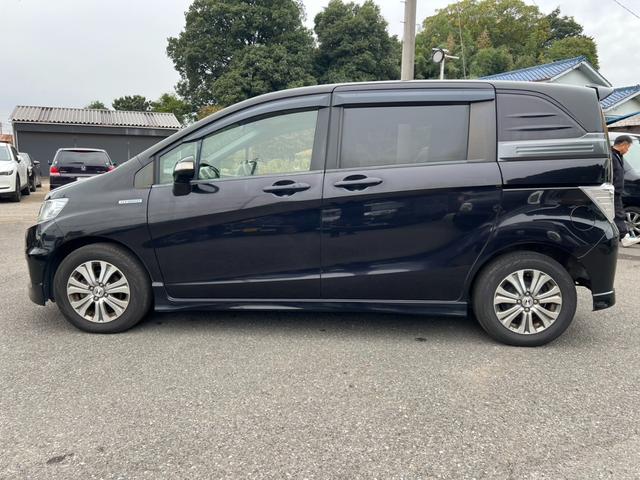 フリードスパイクハイブリッド ジャストセレクション　ハイブリッド　ＥＴＣ　バックカメラ　ナビ　ＴＶ　両側電動スライドドア　オートクルーズコントロール　ＨＩＤ　キーレスエントリー　アイドリングストップ　電動格納ミラー　ＣＶＴ　アルミホイール　ＣＤ　ＡＢＳ（30枚目）