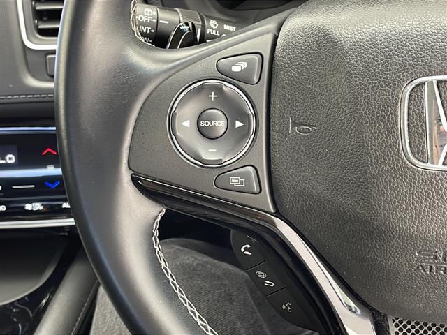 ヴェゼル ハイブリッドZ・ホンダセンシング 禁煙車 ホンダセンシング 純正9インチナビ BT/CD/DVD/TV ステアリングスイッチ オートライト オートワイパー スマートキーFシートヒーター 純正AW LEDライト パドルシフト(14枚目)