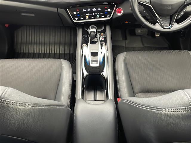 ヴェゼル ハイブリッドZ・ホンダセンシング 禁煙車 ホンダセンシング 純正9インチナビ BT/CD/DVD/TV ステアリングスイッチ オートライト オートワイパー スマートキーFシートヒーター 純正AW LEDライト パドルシフト(25枚目)