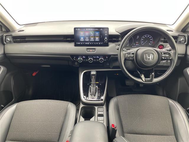 ヴェゼル ｅ：ＨＥＶ　Ｚ　ホンダコネクトナビ　ＢＴ　ＴＶ　カープレイ　ホンダセンシング　レーダークルーズコントロール　衝突軽減ブレーキ　ＢＳＭ　シートヒーター　ハンドルヒーター　ワイヤレス充電　ＥＴＣ２．０　前後ドラレコ（2枚目）