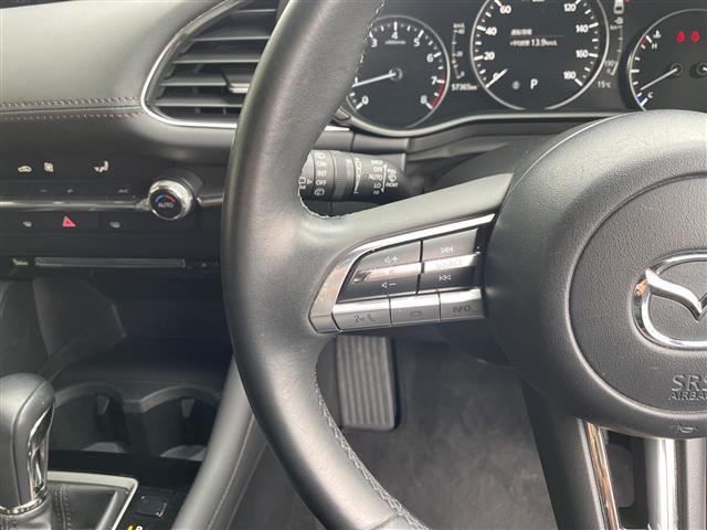 ＭＡＺＤＡ３ファストバック １５Ｓツーリング　純正９型ナビ　レーダークルーズコントロール　バックカメラ　ヘッドアップディスプレイ　コーナーセンサー　純正１８インチアルミホイール　オートマチックハイビーム　ＥＴＣ　ブラインドスポットモニター　ＬＥＤ（22枚目）