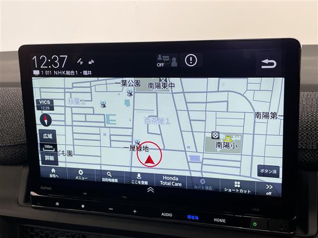 ステップワゴン ｅ：ＨＥＶエアー　ＥＸ　登録済未使用車　純正１１．４型ナビ　１５．６型フリップダウンモニター　両側パワースライドドア　レーダークルーズコントロール　シートヒーター　バックカメラ　電動リアゲート　ブラインドスポットモニター（3枚目）