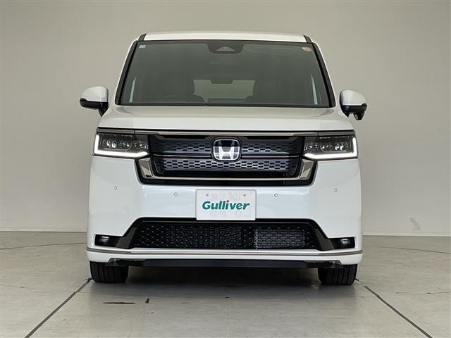 ステップワゴン ｅ：ＨＥＶスパーダ　登録済未使用車　ホンダセンシング　純正１１．４型ナビ　両側パワースライドドア　レーダークルーズコントロール　シートヒーター　バックカメラ　コーナーセンサー　純正アルミホイール　ブラインドスポットモニタ（18枚目）