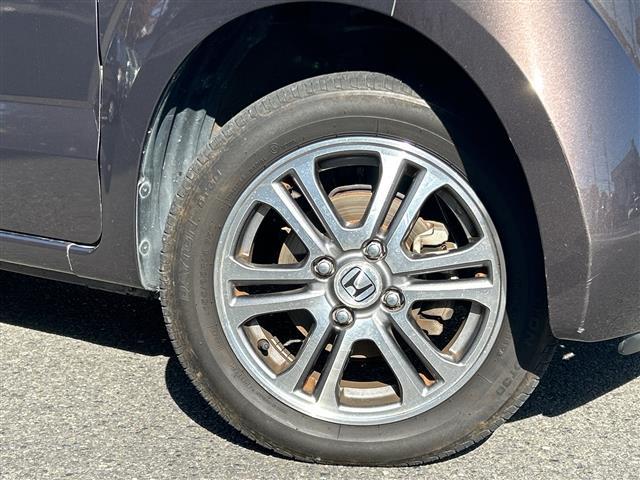 N-BOX G・Lパッケージ 4WD 社外メモリナビ横滑り防止装置 盗難防止装置 ETC ドアバイザー パワースライドドア 14インチ純正アルミホイール チップアップシート スペアキー1本 プッシュスタート スペアキー1本(35枚目)