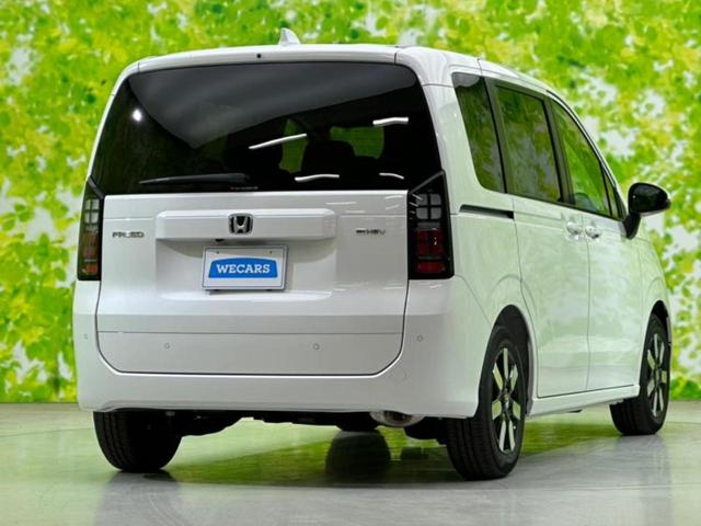 フリード eHEVエアーEX 保証書/純正 9インチ ナビ/ホンダセンシング/両側電動スライドドア/シートヒーター 前席/車線逸脱防止支援システム/パーキングアシスト バックガイド/登録済未使用車 衝突被害軽減システム 禁煙車(3枚目)