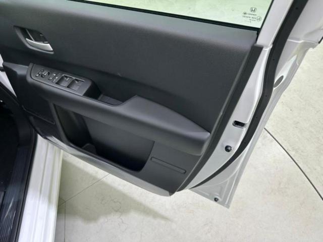 フリード eHEVエアーEX 保証書/純正 9インチ ナビ/ホンダセンシング/両側電動スライドドア/シートヒーター 前席/車線逸脱防止支援システム/パーキングアシスト バックガイド/登録済未使用車 衝突被害軽減システム 禁煙車(25枚目)