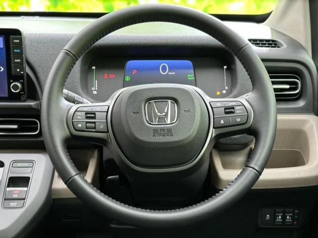 フリード eHEVエアーEX 保証書/純正 9インチ ナビ/ホンダセンシング/両側電動スライドドア/シートヒーター 前席/車線逸脱防止支援システム/パーキングアシスト バックガイド/登録済未使用車 衝突被害軽減システム 禁煙車(27枚目)