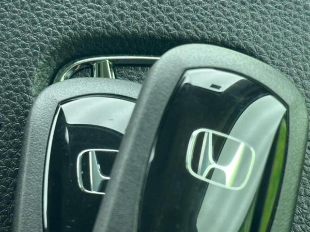 フリード eHEVエアーEX 保証書/純正 9インチ ナビ/ホンダセンシング/両側電動スライドドア/シートヒーター 前席/車線逸脱防止支援システム/パーキングアシスト バックガイド/登録済未使用車 衝突被害軽減システム 禁煙車(30枚目)