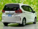 フリードハイブリッド ハイブリッドGホンダセンシング 純正 SDナビ/衝突安全装置/両側電動スライドドア/車線逸脱防止支援システム/ヘッドランプ LED/ETC/EBD付ABS/横滑り防止装置/アイドリングストップ/クルーズコントロール バックカメラ 中古車画像_3
