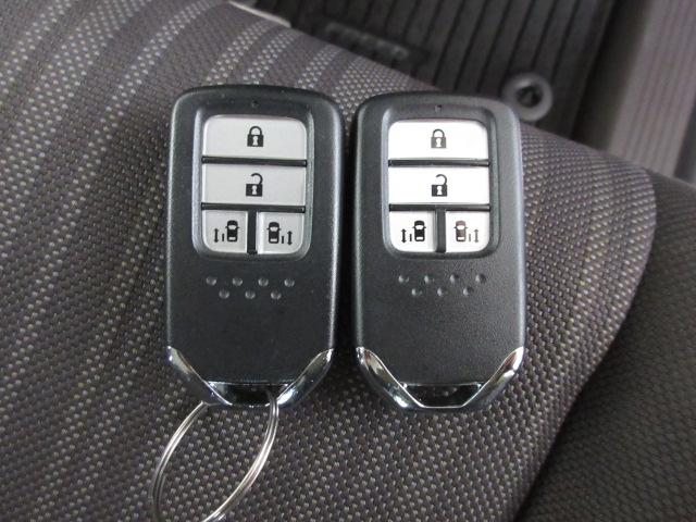 フリードハイブリッド ハイブリッド・Gホンダセンシング 禁煙車 LEDヘッドライト ETC スマートキー 純正ナビ リアカメラ ドラレコ 軽減ブレーキ キーフリーシステム 1オ-ナ- 記録簿 DVD再生可能 サイドカーテンエアバック ECON Aクルーズ(29枚目)