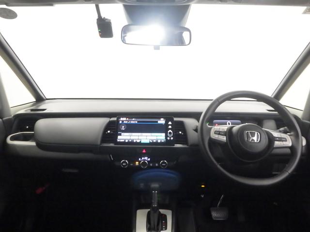 フィット e:HEVホーム 禁煙車/元デモカー/LEDヘッドライト/ホンダセンシング/ドラレコ 助手席エアバッグ 運転席エアバッグ アイドリングストップ LEDライト バックカメラ ABS サイドエアバッグ フルセグTV 記録簿(12枚目)