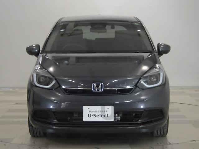 フィット e:HEVホーム 禁煙車/元デモカー/LEDヘッドライト/ホンダセンシング/ドラレコ 助手席エアバッグ 運転席エアバッグ アイドリングストップ LEDライト バックカメラ ABS サイドエアバッグ フルセグTV 記録簿(26枚目)