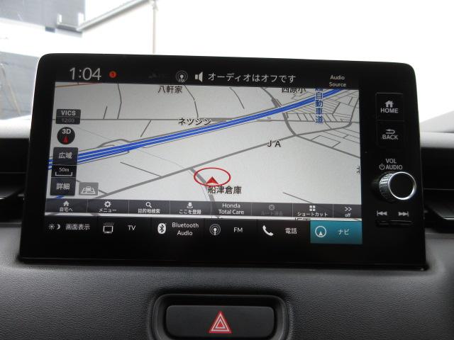 ヴェゼル e:HEVZ 禁煙車 衝突回避支援ブレーキ機能 1オナ スマキ Pトランク フルオートエアコン Dレコ エアバッグ 両席エアバック Rカメ 記録簿付 パワーウィンドウ LEDランプ ソナー クルーズC ナビ&TV(2枚目)