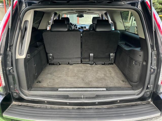 キャデラックエスカレード ＥＳＶ　０７年モデル　４ＷＤ　カロッツェリアナビ　フルセグテレビ　サンルーフ　パワーバックドア　黒レザーシート　パワーシート　２６インチアルミホイール　サイドだしマフラー　社外テールランプ　ＨＩＤヘッドライト（36枚目）