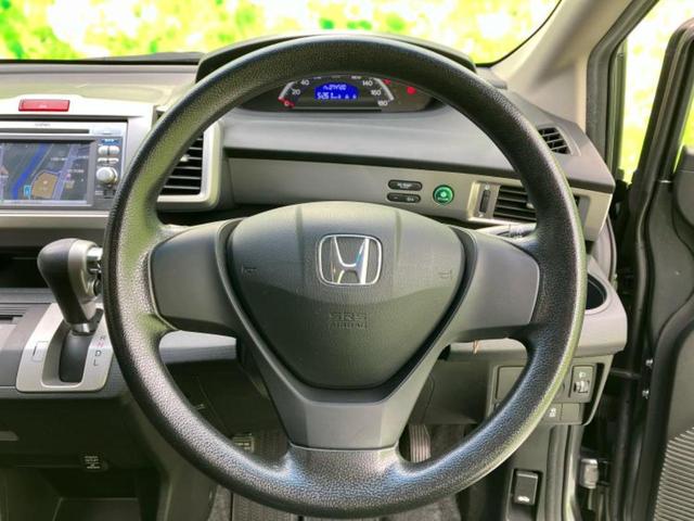 フリード G 新品タイヤ/保証書/純正 SDナビ/ETC/EBD付ABS/ワンセグTV/DVD/エアバッグ 運転席/エアバッグ 助手席/パワーウインドウ/キーレスエントリー/パワーステアリング/マニュアルエアコン(15枚目)