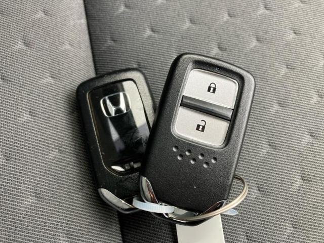 フィット eHEVベーシック 新品タイヤ/保証書/衝突安全装置/車線逸脱防止支援システム/ヘッドランプ LED/ETC/EBD付ABS/横滑り防止装置/アイドリングストップ/クルーズコントロール/エアバッグ 運転席 レーンアシスト(34枚目)