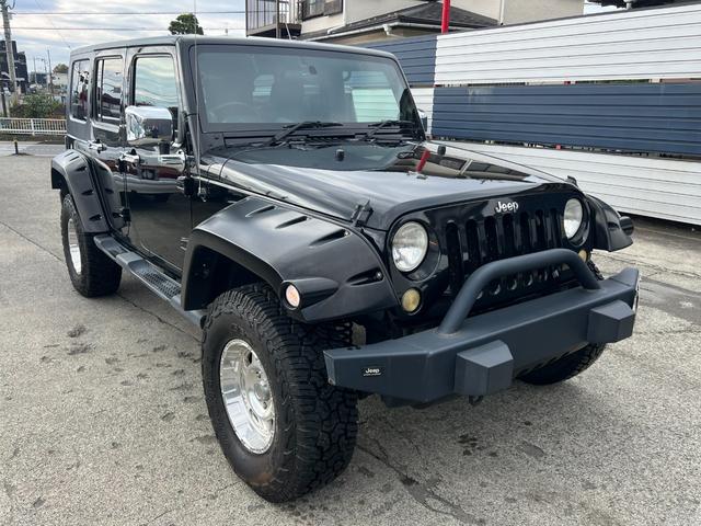 ジープ・ラングラーアンリミテッド スポーツ　社外バンパー　オーバーフェンダー　ＰＲＯＣＯＭＰ１６ＡＷ　マッドタイヤ　社外ＨＤＤナビ　ＥＴＣ　純正サイドカメラ　ＫＩＣＫＥＲスピーカー（24枚目）