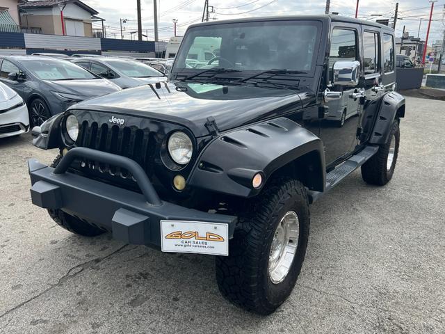 ジープ・ラングラーアンリミテッド スポーツ　社外バンパー　オーバーフェンダー　ＰＲＯＣＯＭＰ１６ＡＷ　マッドタイヤ　社外ＨＤＤナビ　ＥＴＣ　純正サイドカメラ　ＫＩＣＫＥＲスピーカー（25枚目）