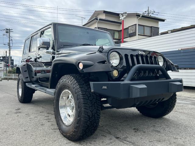 ジープ・ラングラーアンリミテッド スポーツ　社外バンパー　オーバーフェンダー　ＰＲＯＣＯＭＰ１６ＡＷ　マッドタイヤ　社外ＨＤＤナビ　ＥＴＣ　純正サイドカメラ　ＫＩＣＫＥＲスピーカー（26枚目）