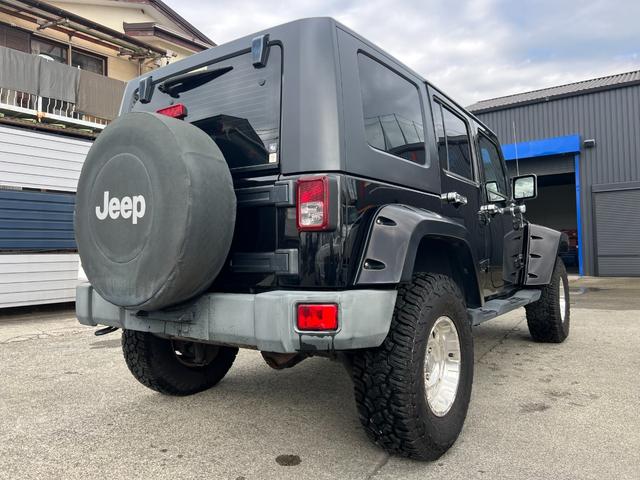 ジープ・ラングラーアンリミテッド スポーツ　社外バンパー　オーバーフェンダー　ＰＲＯＣＯＭＰ１６ＡＷ　マッドタイヤ　社外ＨＤＤナビ　ＥＴＣ　純正サイドカメラ　ＫＩＣＫＥＲスピーカー（33枚目）