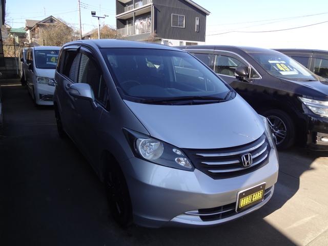 フリード Ｇ　ジャストセレクション　純正ナビ　ＴＶ　後席モニター　キーレス　バックカメラ　ＥＴＣ　片側パワースライド（2枚目）