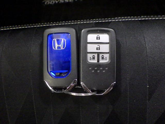 オデッセイハイブリッド ハイブリッドアブソルート・EXホンダセンシング 禁煙車 FOPナビ 後席モニター マルチビューカメラ パーキングアシスト フルセグTV CD/DVD再生 USB接続 HDMI Bluetooth接続 iPod LEDライト ETC 衝突被害軽減S(27枚目)