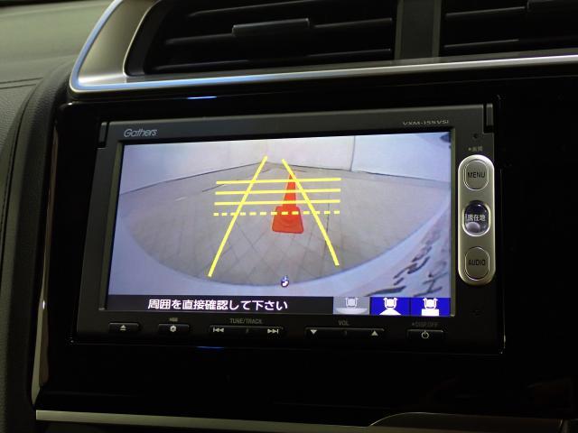 フィットハイブリッド Ｌパッケージ　１オーナ　禁煙　サイドエアバック　ＤＶＤ再生　ＬＥＤ　ＥＣＯＮ　バックカメラ　オートクルーズコントロール　ＥＴＣ　ＥＳＣ　ＡＵＴＯエアコン　ＡＢＳ　運転席助手席エアバッグ　キーフリー（14枚目）