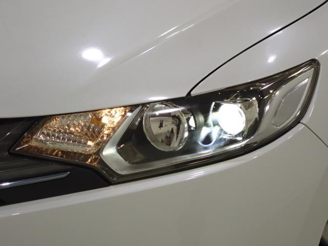 フィットハイブリッド Ｌパッケージ　１オーナ　禁煙　サイドエアバック　ＤＶＤ再生　ＬＥＤ　ＥＣＯＮ　バックカメラ　オートクルーズコントロール　ＥＴＣ　ＥＳＣ　ＡＵＴＯエアコン　ＡＢＳ　運転席助手席エアバッグ　キーフリー（15枚目）