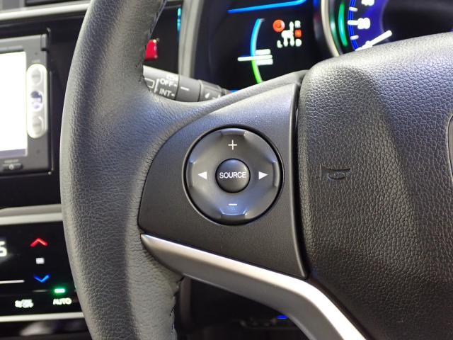 フィットハイブリッド Ｌパッケージ　１オーナ　禁煙　サイドエアバック　ＤＶＤ再生　ＬＥＤ　ＥＣＯＮ　バックカメラ　オートクルーズコントロール　ＥＴＣ　ＥＳＣ　ＡＵＴＯエアコン　ＡＢＳ　運転席助手席エアバッグ　キーフリー（18枚目）