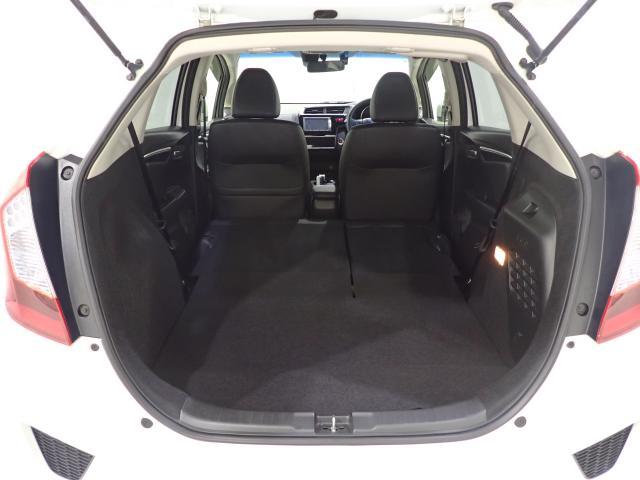 フィットハイブリッド Ｌパッケージ　１オーナ　禁煙　サイドエアバック　ＤＶＤ再生　ＬＥＤ　ＥＣＯＮ　バックカメラ　オートクルーズコントロール　ＥＴＣ　ＥＳＣ　ＡＵＴＯエアコン　ＡＢＳ　運転席助手席エアバッグ　キーフリー（22枚目）