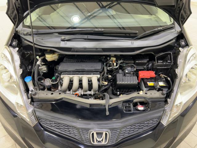 フィット １３Ｇ・スマートセレクション　記録簿付き　禁煙　ＵＳＢ入力　Ｗエアバッグ　セキュリティアラーム　ＥＴＣ付き　ＤＶＤ再生　キーフリー　ＰＳ　オートエアコン　ＰＷ　エアバック　ＡＢＳ　ワンセグ　ナビＴＶ　ワンオーナー　スマキ－（19枚目）