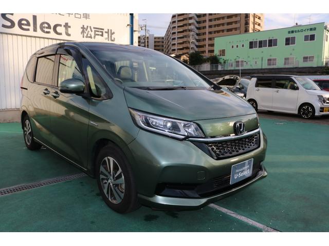 フリードハイブリッド ハイブリッド・Ｇホンダセンシング　軽減ブレーキ　キーフリーシステム　電動格納式ドアミラー　衝突安全ボディ　１オ－ナ－　記録簿　ＤＶＤ再生可能　サイドカーテンエアバック　後カメラ　Ａクルーズ　横滑防止（8枚目）
