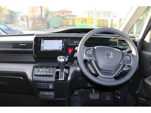 ステップワゴンスパーダ スパーダホンダセンシング LKA 助手席エアバッグ ワンオーナ- Wパワスラ 記録簿有 地デジ サイドエアバッグ ベンチシート LEDライト 電動格納ドアミラー 横滑り防止システム オートエアコン(10枚目)