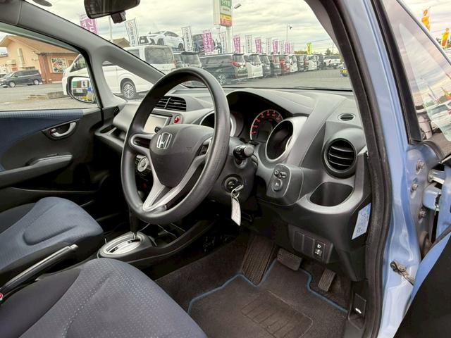 フィット G【買取直販】 社外メモリーナビ CD再生 ワンセグTV ヘッドライトレベライザー ETC 電動格納ミラー ミラーウィンカー キーレスエントリー オートA/C Wエアバック 禁煙(3枚目)