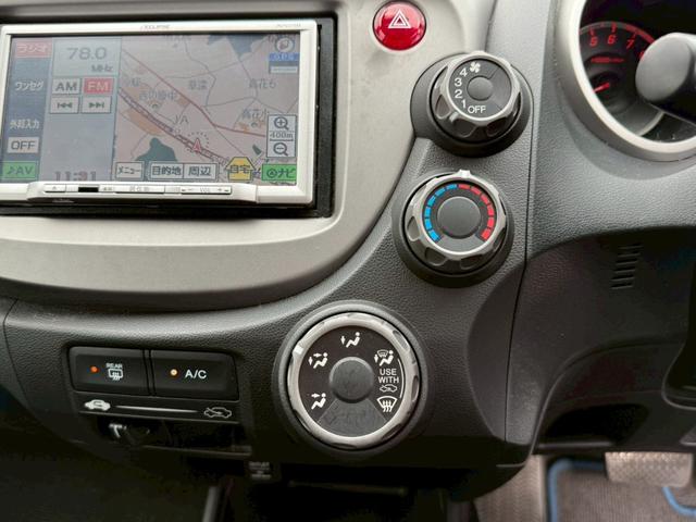 フィット G【買取直販】 社外メモリーナビ CD再生 ワンセグTV ヘッドライトレベライザー ETC 電動格納ミラー ミラーウィンカー キーレスエントリー オートA/C Wエアバック 禁煙(4枚目)