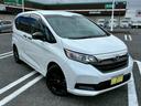 フリード Ｇブラックスタイル　買取直販車　禁煙　６人乗り　ワンオーナー　純正９インチナビ　バックカメラ　フルセグ　Ｂｌｕｅｔｏｏｔｈ　レザー調シートカバー　ホンダセンシング　シートヒーター　両側電動スライドドア　ＥＴＣ　ドラレコ（6枚目）