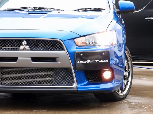 全国でも台数の少ないライトニングブルー外装色のランサープレミアムが入庫！過去分解整備記録簿も１３枚残っており、令和７年６月にＨＫＳ車高調も新品取付け済。令和４年５月ＳＳＴストレーナー交換済みです