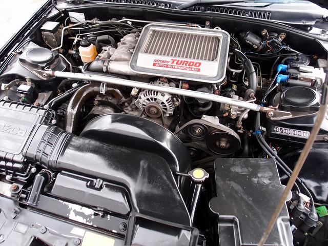 サバンナRX-7 カブリオレ 走行44961kmディーラーリビルトエンジン載替 令和7年1月ディーラー全塗装 整備記録簿14枚 ディーラー納品書23枚 BBS16AW フジツボマフラー 茶革 5MT 整備部品交換歴 電動オープン(17枚目)