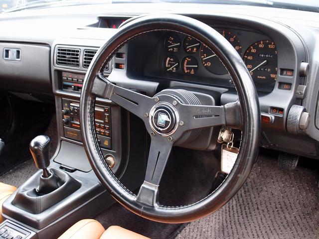 サバンナRX-7 カブリオレ 走行44961kmディーラーリビルトエンジン載替 令和7年1月ディーラー全塗装 整備記録簿14枚 ディーラー納品書23枚 BBS16AW フジツボマフラー 茶革 5MT 整備部品交換歴 電動オープン(76枚目)