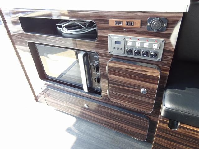 キャンピングカー バンコン ダイレクトカーズ製 冷蔵庫 サブBT 走行充電 外部電源・充電 冷蔵庫 シンク・ポリ容器 8ナンバー レンジ ベンチシート リアクーラー・ヒーター インバーター(8枚目)