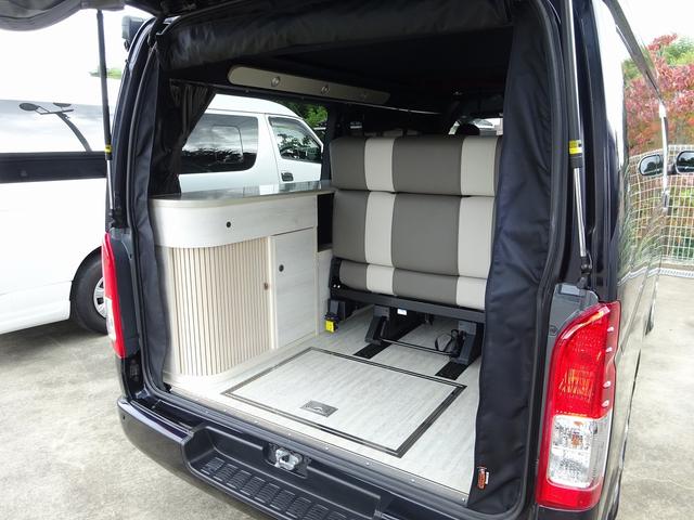 ハイエースバン キャンピングカー ケイワークス オーロラスタークルーズSL バンコン シンク エバスペヒャー製FFヒーター シングルサブ 1500Wインバーター フレキシブルソーラー サイドオーニング 電子レンジ 給排水19L フリップダウンモニター ポップアップ TSS(7枚目)