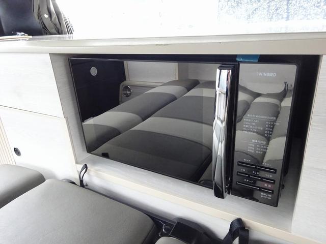 ハイエースバン キャンピングカー ケイワークス オーロラスタークルーズSL バンコン シンク エバスペヒャー製FFヒーター シングルサブ 1500Wインバーター フレキシブルソーラー サイドオーニング 電子レンジ 給排水19L フリップダウンモニター ポップアップ TSS(17枚目)