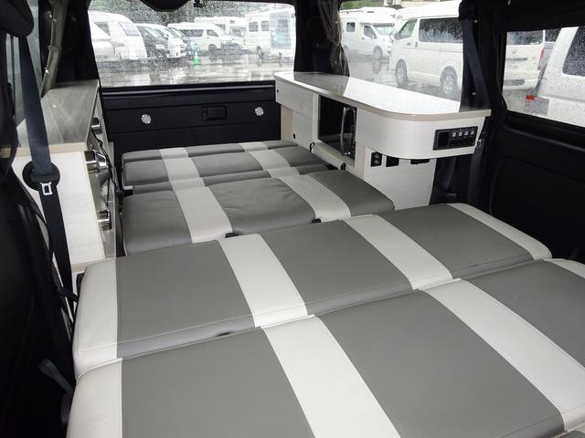 ハイエースバン キャンピングカー ケイワークス オーロラスタークルーズSL バンコン シンク エバスペヒャー製FFヒーター シングルサブ 1500Wインバーター フレキシブルソーラー サイドオーニング 電子レンジ 給排水19L フリップダウンモニター ポップアップ TSS(24枚目)