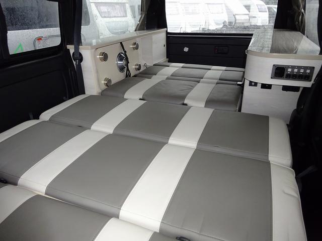 ハイエースバン キャンピングカー ケイワークス オーロラスタークルーズSL バンコン シンク エバスペヒャー製FFヒーター シングルサブ 1500Wインバーター フレキシブルソーラー サイドオーニング 電子レンジ 給排水19L フリップダウンモニター ポップアップ TSS(25枚目)