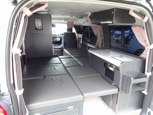 ハイエースワゴン キャンピングカー リンエイ バカンチェスプライベート バンコン シンク DC冷蔵庫 べバストFFヒーター ツインサブバッテリー 走行充電 インバーター2000W ソーラーパネル 電子レンジ 走行時リアクーラー・リアヒーター 給排水タンク 液晶テレビ(8枚目)