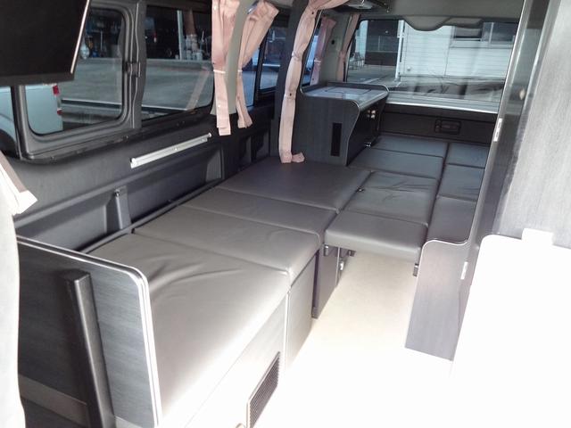 ハイエースワゴン キャンピングカー リンエイ バカンチェスプライベート バンコン シンク DC冷蔵庫 べバストFFヒーター ツインサブバッテリー 走行充電 インバーター2000W ソーラーパネル 電子レンジ 走行時リアクーラー・リアヒーター 給排水タンク 液晶テレビ(9枚目)